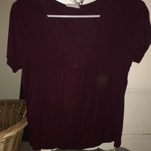 Tillys super cute criss-crossed maroon shirt!